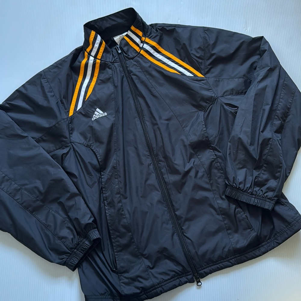 Vintage Adidas black, orange & white windbreaker jacket.  Men’s size small